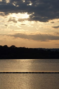 The beautiful sunset on the water background