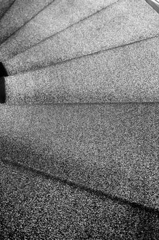close up black and white spiral staircase