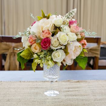 Blossom rose placed on the desk in dine room