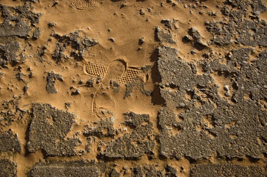 old used concrete pavement and sand abstract background