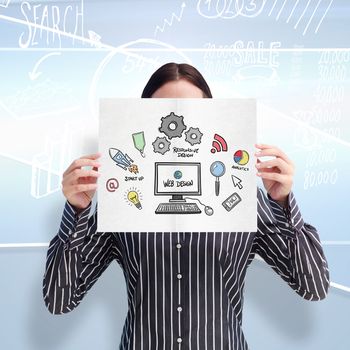 Smiling woman showing a big business card in front of her face against linear grey background