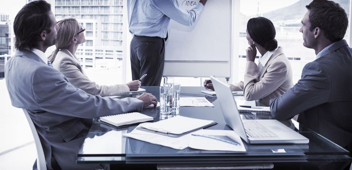 Young business people in board room meeting at the office