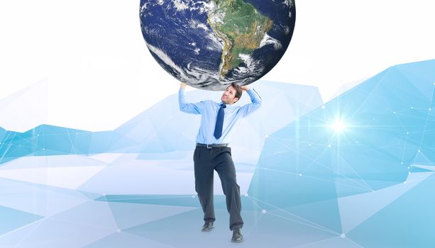 Businessman carrying the world against blue abstract design