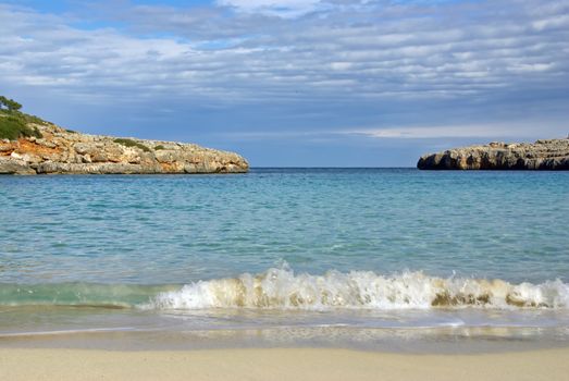 Waves in a beautiful beach on the island of Mallorca (spain) - Cala Marsal