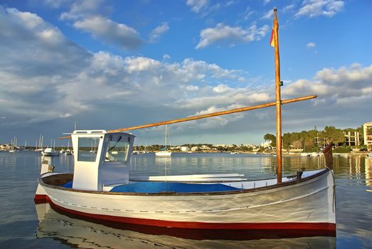 Typical majorquin fishing boat known as "Llaut". Porto Colom (Majorca - Spain)