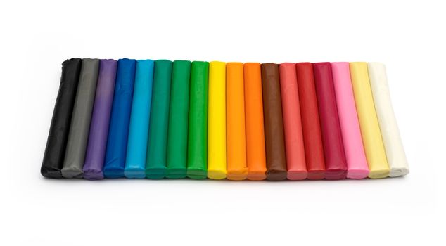 Set of colorful plasticine isolated on a white background