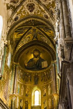 The Christ Pantokrator in Cathedral-Basilica of Cefalu, which is an old Roman Catholic church in Cefalu, Sicily, southern Italy.