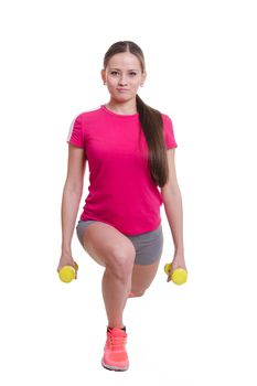 Young beautiful girl athlete spends Europeans physical exercise