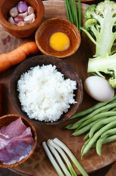 Vietnamese food, fried rice, a delicious Asian eating, raw material as carrot, cooked rice, meat, egg, sausage, onion, garlic, this meal rich cholesterol, calories