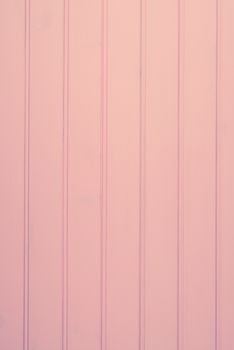 wood texture with pink color background.