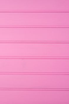 wood texture with pink color background.