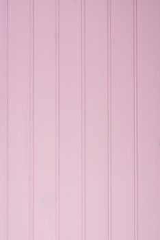 wood texture with pink color background.