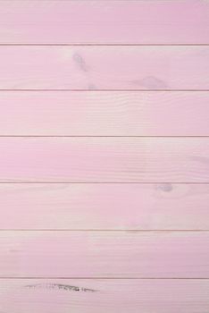 wood texture with pink color background.