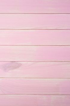 wood texture with pink color background.