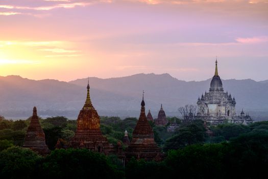 Colorful sunset landscape view with silhouettes of temples, Bagan, Myanmar (Burma)