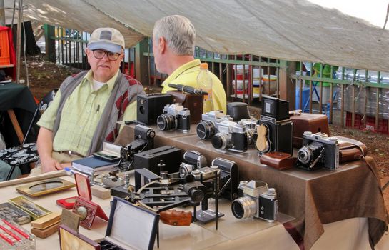 Sao Paulo, Brazil, July 18 2015: Unidentified elderly men in the traditional antique objects market that has been held all Saturdays in Benedito Calixto square in Sao Paulo Brazil. 