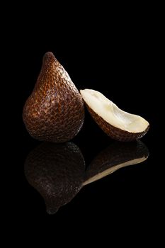 Salak fruit isolated on black background. Tropical asian fruit.