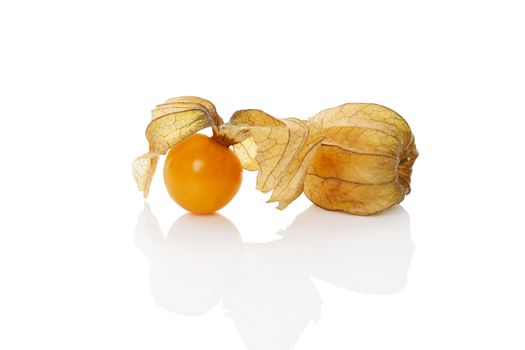 Physalis, ground cherry isolated on white background. Tropical healthy fruit eating.
