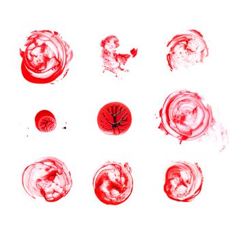 Various blood splatter isolated on white background, top view.