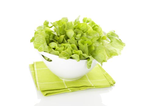 Fresh green salad in white bowl isolated on white background. Fresh healthy summer eating. Culinary arts. Modern minimal image language.