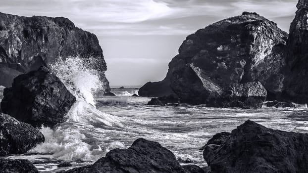 Waves Crashing on a Rocky Coast, Black and White Image, Landscape