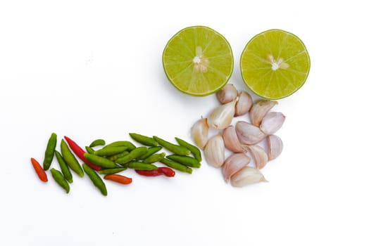 Chili peppers, garlic and lime on white background. Asian ingredients food