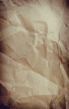 Crumpled paper background vignette space for text or image.Old paper texture