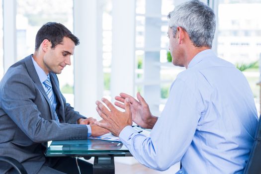 Business people speaking together in office 