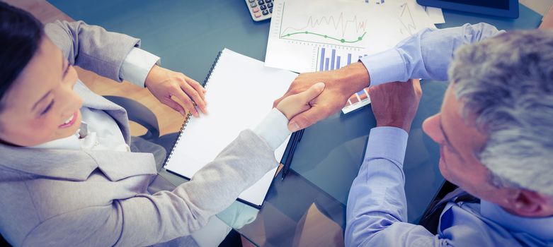 Business people shaking hands in office