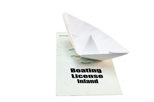 Document from the German boat driving license inland. With small paper ship as a symbol.