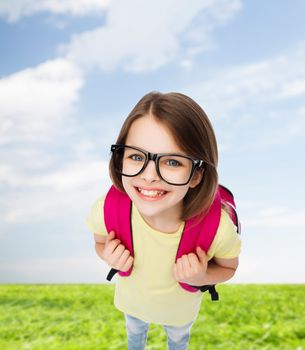 education and school concept - happy and smiling teenage girl in eyeglasses with bag