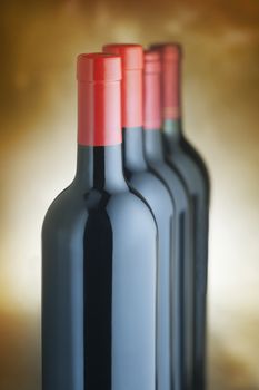 Red wine bottles stacked vertically