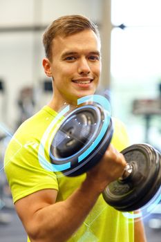 sport, fitness, lifestyle and people concept - smiling man with dumbbell in gym