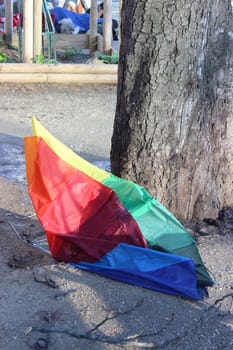 Broken multi color umbrella in Paris, France