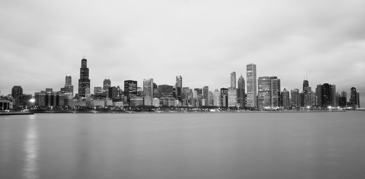 High contrast sunrise lights the long downtown Chicago skyline