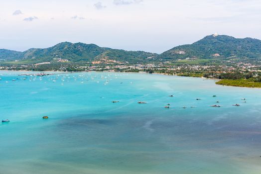 High angle view pier for travel boat at Ao Chalong bay in Phuket Island is a tourist town by the sea from Khao-Khad mountain viewpoint famous attractions of Thailand