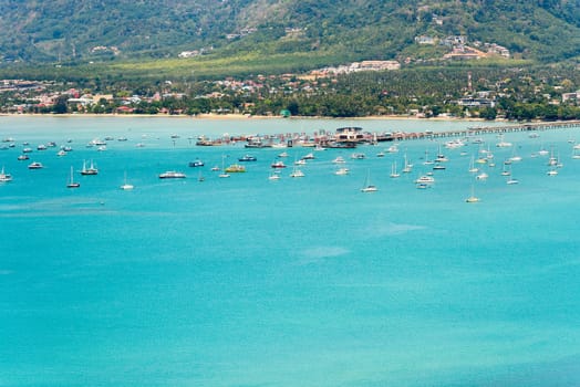 High angle view pier for travel boat at Ao Chalong bay in Phuket Island is a tourist town by the sea from Khao-Khad mountain viewpoint famous attractions of Thailand
