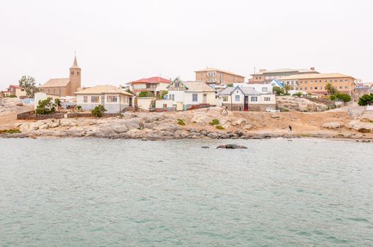 LUDERITZ, NAMIBIA - JUNE 14, 2011: A view of Luderitz on a gloomy day. The small town was founded by the German settlers in 1883 and has a distinct German atmosphere