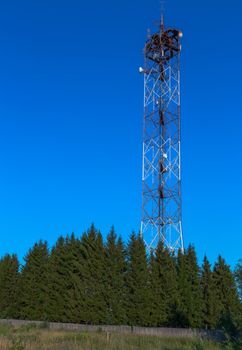 tower TV repeater on blue sky background