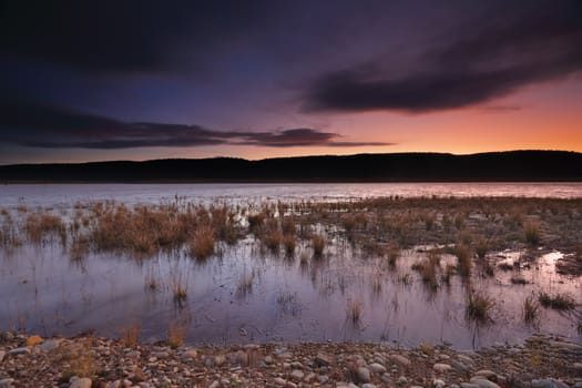 Last light over the Penrith Lakes views to Blue Mountains from Lake Burralow