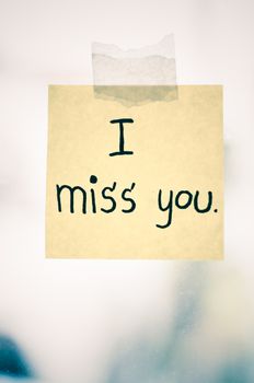I miss you word sticky note on window mirror vintage style