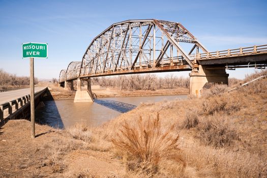 An unused railroad bridge sit rusting in the dry northern winter