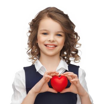happy children, charity and health concept - picture of beautiful girl with small red heart