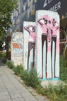 BERLIN, GERMANY - JULY 07: Segments of Berlin Wall in East Berlin filled with grafitti art. July 07, 2015 in Berlin.