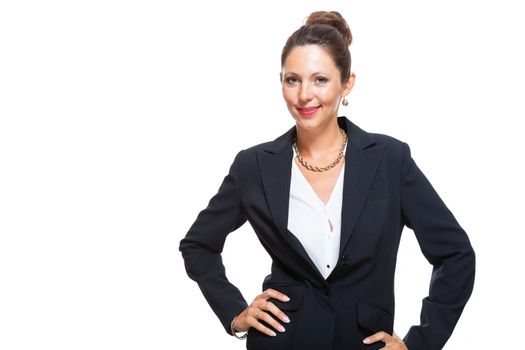 Portrait of a Confident Young Businesswoman in Black Suit, Smiling at the Camera with Arms Crossing Over her Stomach, Isolated on White Background