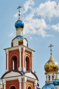 The dome of the church against the blue sky