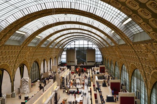 Paris, France - May 14, 2015: Visitors in the Musee d'Orsay in Paris, France. on May 14, 2015, The museum houses the largest collection of impressionist and post-impressionist masterpieces in the world.