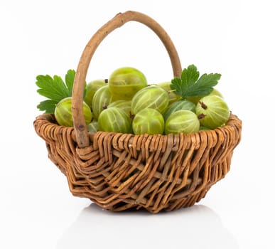 fresh gooseberry in a wicker basket, on a white background