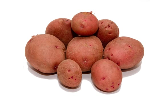 The earth is freshly picked potatoes in the kitchen ..