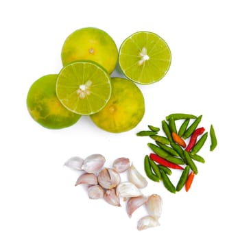 Chili peppers, garlic and lime on white background. Asian ingredients food